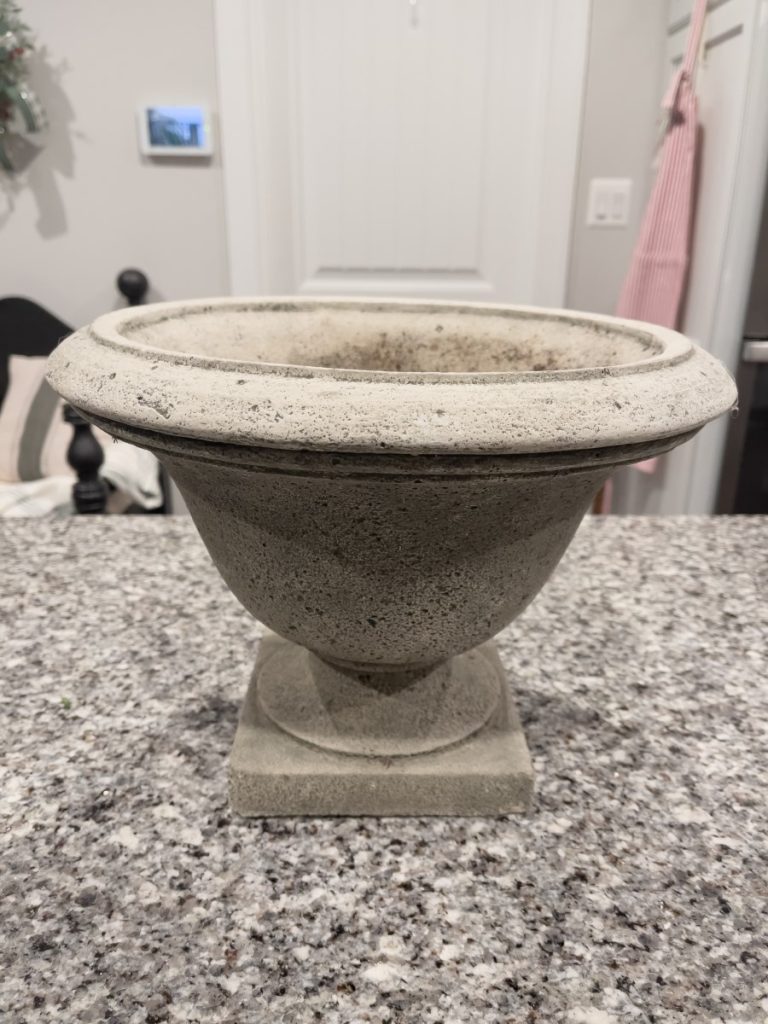 Concrete urn will be used to plant bulbs.