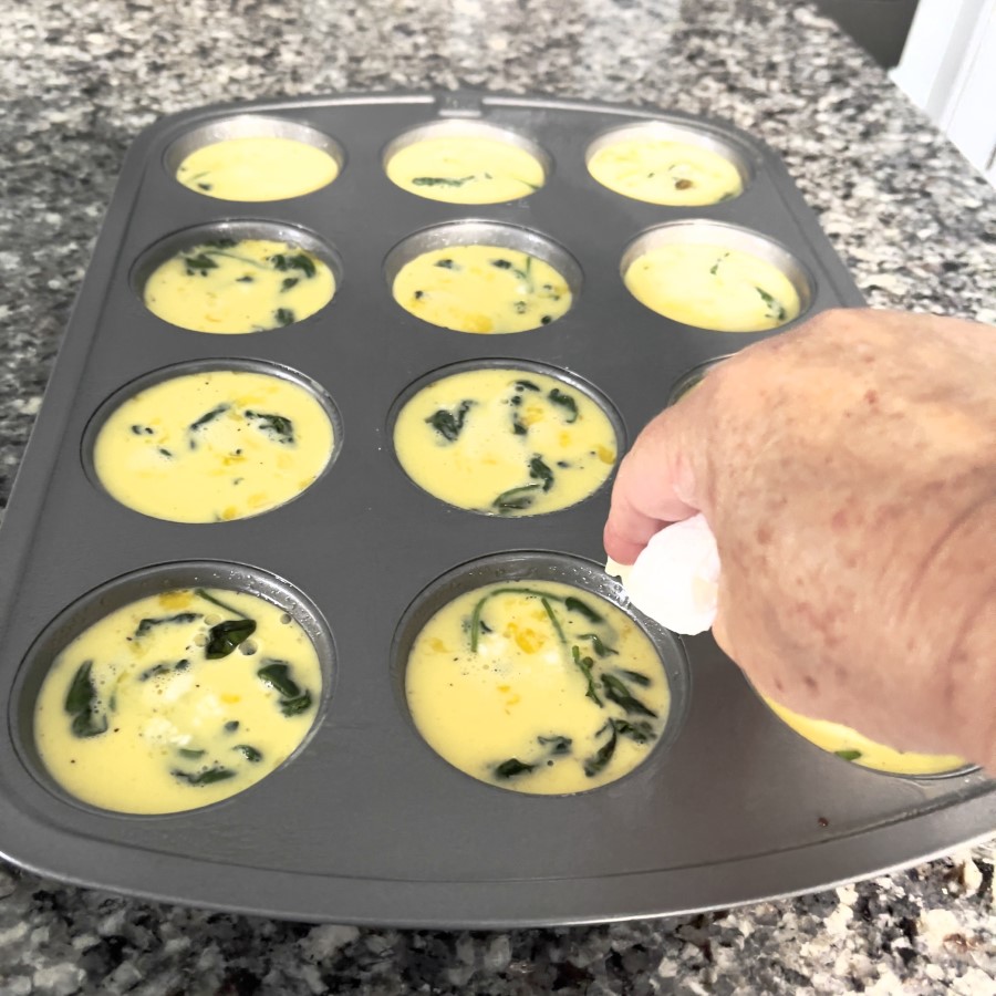 Wipe off any spilt egg mixture or oil from the top of the pan.