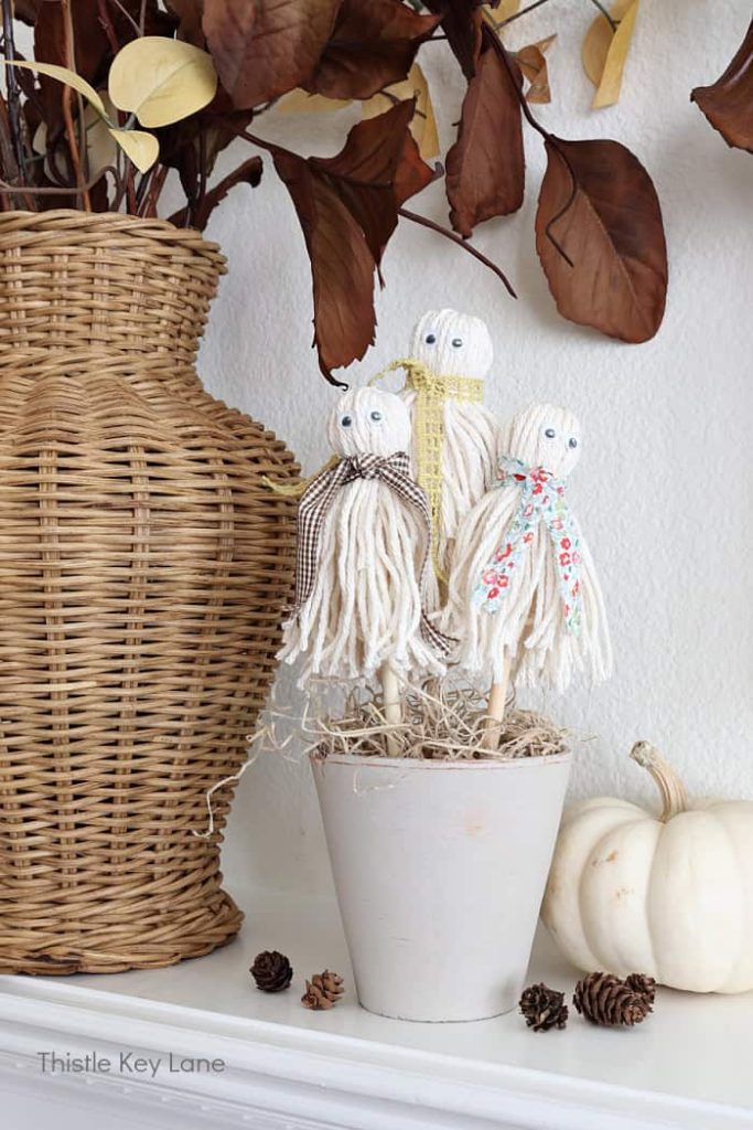 Yarn Ghosts craft project made by Thistle Key Lane.