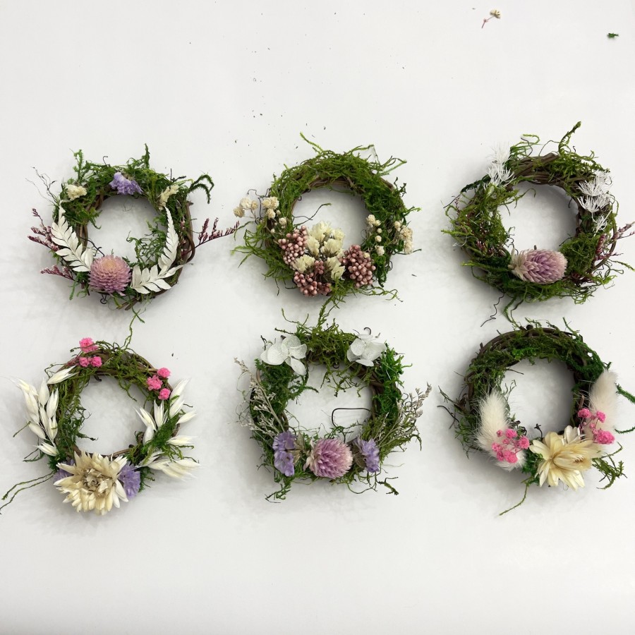 Natural Mini Wreaths for bridal or baby shower favors. 3-inch grapevine wreath with dried flowers and green moss.