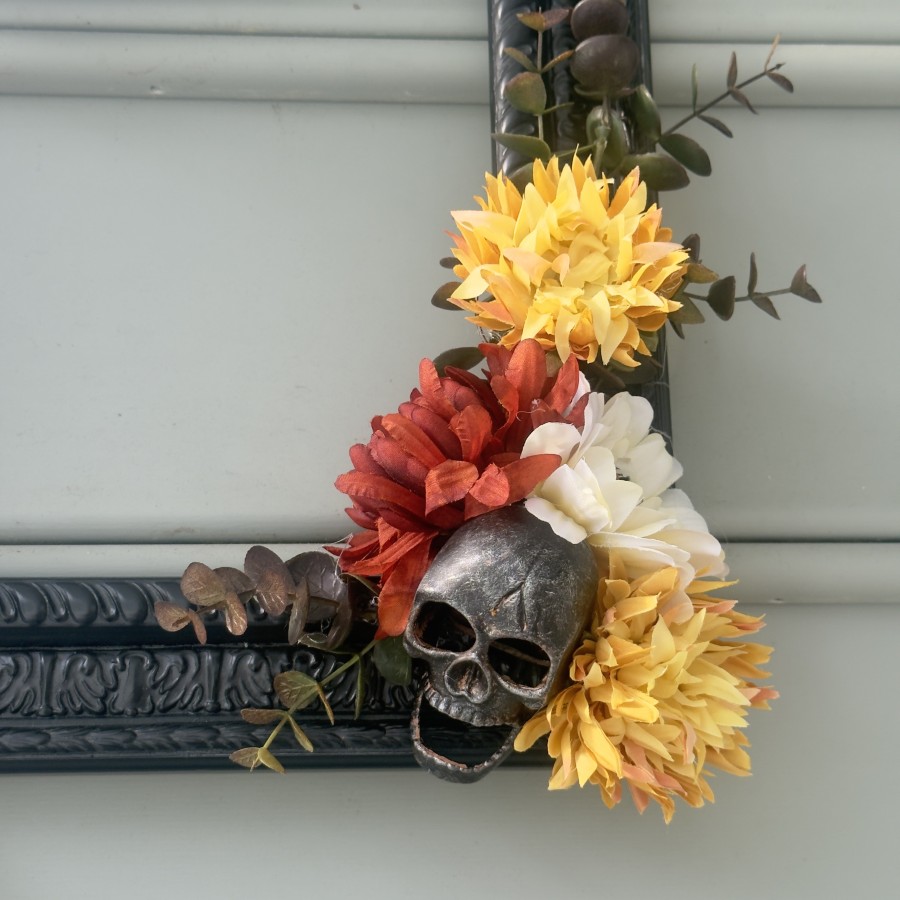 Fun Halloween wreath with hues of gold, rust, creams and greens.