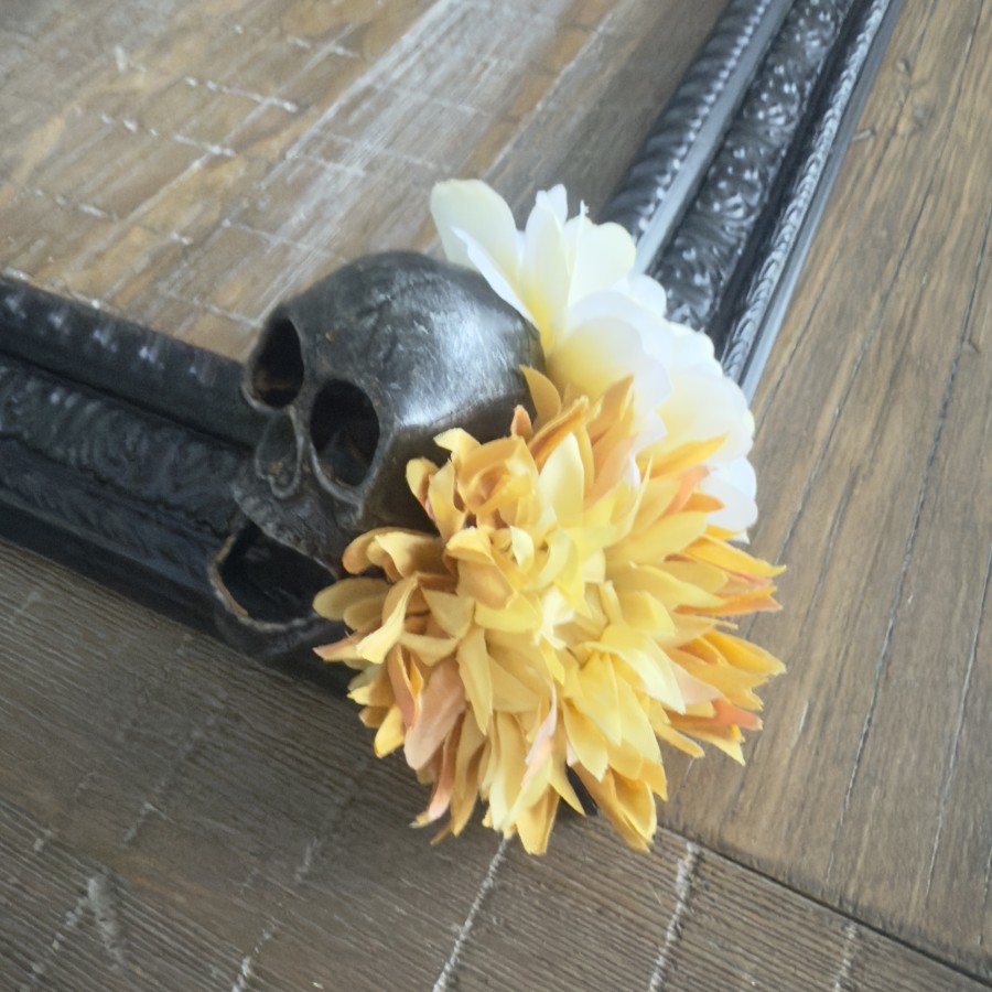 Metal Skull with gold and cream mums.